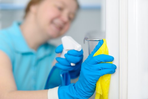 Cleaning carpet tiles and office flooring in Brent workplace